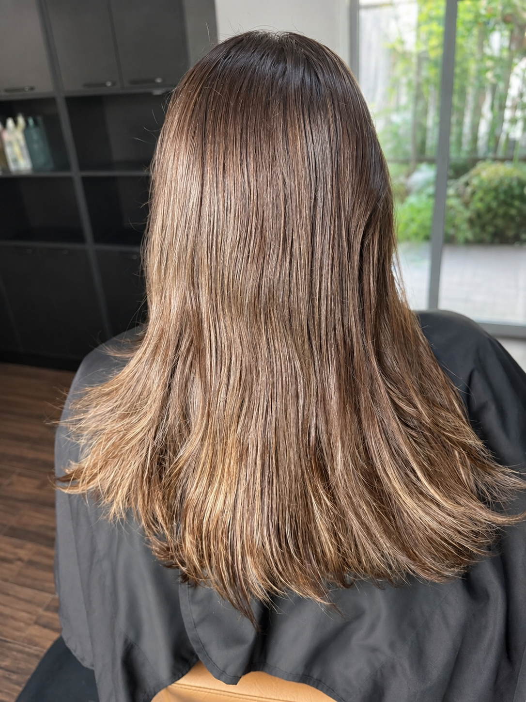 Before photo showing brunette hair prior to rose color transformation