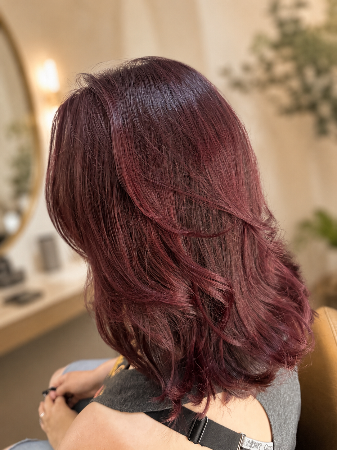 Finished burgundy layered haircut and color by Hayley