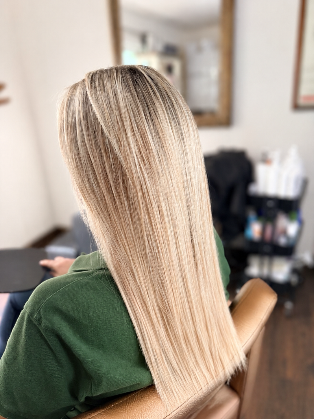 After side view showing the silky polished finish of a blonde keratin smoothing treatment